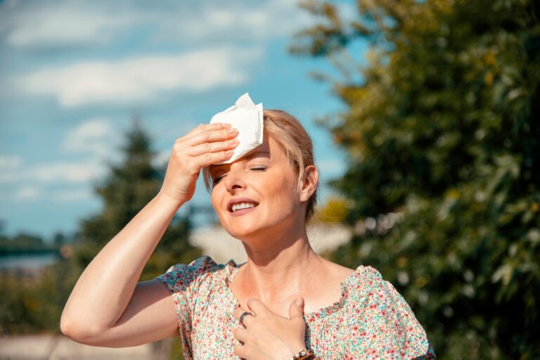 Portrait,Of,Blonde,Pretty,Woman,Having,Hot,Flash,And,Sweating