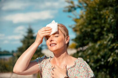 Portrait,Of,Blonde,Pretty,Woman,Having,Hot,Flash,And,Sweating